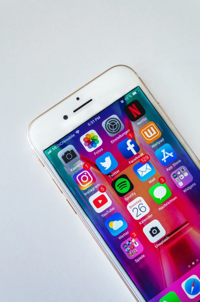 A closeup of a smartphone with social media apps.